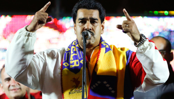 President Nicolas Maduro talks to supporters (Reuters/Carlos Garcia Rawlins)