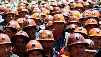 Mine workers attend a ceremony in La Paz, Bolivia (Reuters/Gaston Brito)