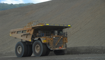 A truck carries ore at Newmont Mining Corp's copper and gold mine on Indonesia's Sumbawa island  (Reuters/Neil Chatterjee)