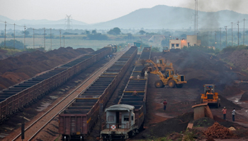 Freight trains are loaded with iron ore at a railway station at Chitradurga in the southern state of Karnataka (Reuters/Danish Siddiqui)