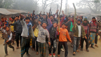 Protesters shout slogans during a clash with police in Gaibandha (Reuters/Stringer)