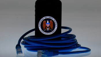 A picture showing the logo of the U.S. National Security Agency on the display of an iPhone (Reuters/Pawel Kopczynski)