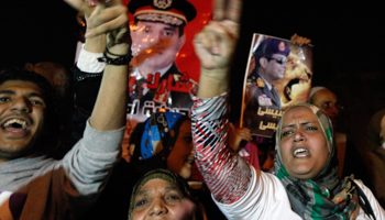 Supporters of Egypt's army chief General Abdel Fattah al-Sisi celebrate the passing of a new constitution in Cairo  (Reuters/Mohamed Abd El Ghany)