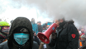 Opposition leader Vitaly Klitschko is sprayed with a powder fire extinguisher during a rally in Kiev (Reuters/Valentyn Ogirenko)