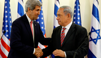 US Secretary of State John Kerry shakes hands with Prime Minister Benjamin Netanyahu during a news conference (Reuters/Gali Tibbon/Pool)