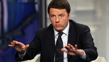 Italy's centre-left Democratic Party leader Matteo Renzi gestures as he appears as a guest on a RAI television show (Reuters/Remo Casilli)