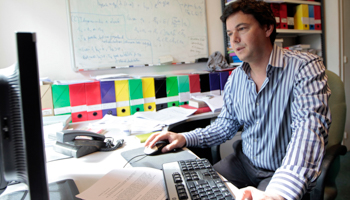 Thomas Piketty, French economist behind French President Francois Hollande (Reuters/Charles Platiau)