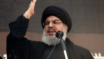 Hezbollah leader Sayyed Hassan Nasrallah addresses his supporters during a religious procession in Beirut's suburbs (Reuters/Khalil Hassan)