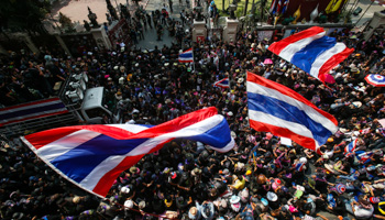 Anti-government protesters gather outside the Royal Thai Police headquarters in central Bangkok (Reuters/Athit Perawongmetha)