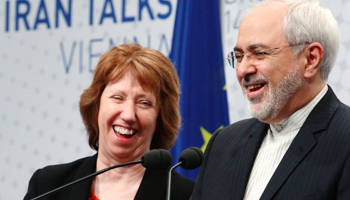 EU foreign policy chief Catherine Ashton and Iranian Foreign Minister Mohammad Javad Zarif share a laugh in Vienna (Reuters/Heinz-Peter Bader)