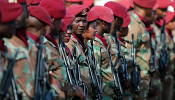 Members of the military stand guard during the funeral of former President Nelson Mandela (Reuters/Siphiwe Sibeko)