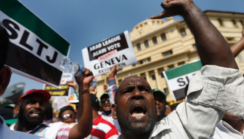 A group of Sri Lankan Muslims shout slogans, protesting against the UN and US resolution against Sri Lankan war crimes (Reuters/Dinuka Liyanawatte)