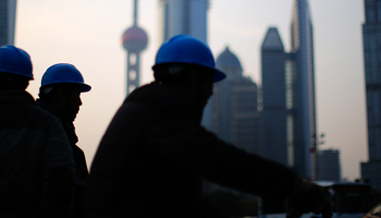 Construction workers in Shanghai (Reuters/Carlos Barria)