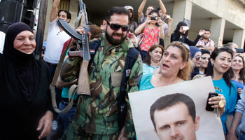 Supporters of Syrian President Bashar al-Assad (Reuters/Khaled al-Hariri)