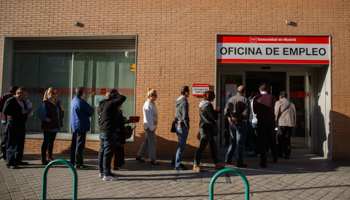 People enter an employment office in Madrid (Reuters/Andrea Comas)