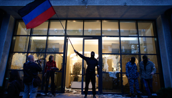 Pro-Russia protesters as they storm the governor's business premises in Donetsk (Reuters/Marko Djurica)