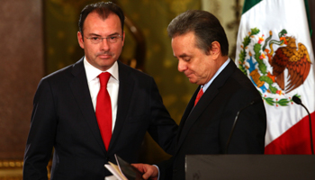 Mexico's Finance Minister Luis Videgaray stands with Energy Minister Pedro Joaquin Coldwell (Reuters/Edgard Garrido)