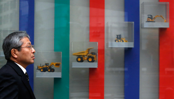 A shop window displays models of heavy machineries at a construction machinery company in Tokyo (Reuters/Yuya Shino)