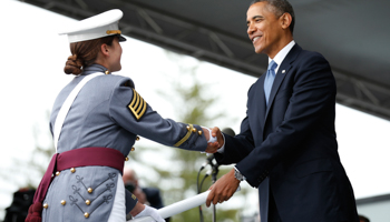 US President Barack Obama hands a diploma to a graduate during a commencement ceremony at the US Military Academy at West Point (Reuters/Kevin Lamarque)