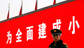 Propaganda slogans on Beijing's Tiananmen Square (Reuters/David Gray)