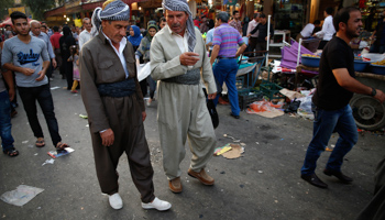 Kurdish men in Iraq's Kurdistan region (Reuters/Ahmed Jadallah)