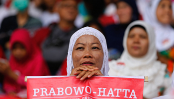 A woman at Indonesia's presidential candidate Prabowo Subianto's campaign rally in Jakarta (Reuters/Beawiharta)