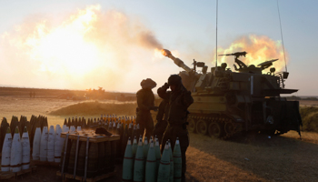 An Israeli mobile artillery unit fires towards the Gaza Strip (Reuters/Nir Elias)
