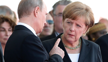 Russian President Vladimir and German Chancellor Angela Merkel (Reuters/Kevin Lamarque)