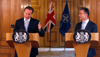 Britain's Prime Minister David Cameron and NATO Secretary-General Anders Fogh Rasmussen (Reuters/Luke MacGregor)