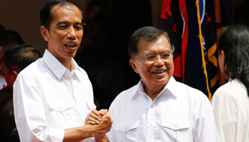 Indonesian presidential candidate Joko "Jokowi" Widodo and his vice presidential running mate Jusuf Kalla (Reuters/Stringer)