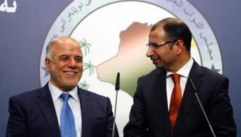 Salim al-Jabouri, new speaker of the Iraqi Council of Representatives, and Shi'ite deputy speaker Haider Abadi, a member of Iraqi Prime Minister Nuri al-Maliki's State of Law bloc, attend a news conference in Baghdad (Reuters/Ahmed Saad)
