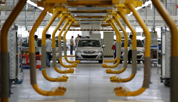 An E150 EV electric car at a factory on the outskirts of Beijing (Reuters/China Daily)