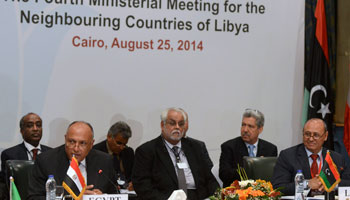 Libyan Foreign Minister Mohammed Abdel Aziz and his Egyptian counterpart Sameh Shoukry attend the Fourth Ministerial Meeting for the Neighbouring Countries of Libya in Cairo (Reuters/Stringer)