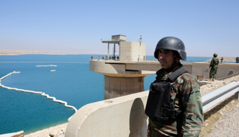 Peshmerga fighters stand guard at Mosul Dam in northern Iraq (Reuters/Youssef Boudlal)