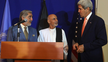 US Secretary of State John Kerry speaks next to Afghan presidential candidates Ashraf Ghani and Abdullah Abdullah (Reuters/Omar Sobhani)