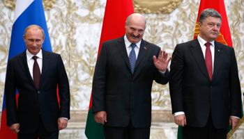 President Vladimir Putin, Belarus' President Alexander Lukashenko and Ukraine's President Petro Poroshenko in Minsk (Reuters/Grigory Dukor)