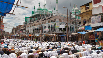 Muslims offer last Friday prayers of the holy fasting month of Ramadan in the northern Indian city of Allahabad (Reuters/Jitendra Prakash)