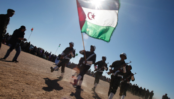 Polisario Front soldiers take part in a parade for the 35th anniversary celebrations of their independence movement for Western Sahara from Morocco, in Tifariti, southwestern Algeria (Reuters/Juan Medina)