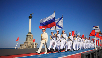 Russian sailors march during celebrations to mark Navy Day (Reuters/Stringer)