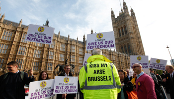 Anti-European Union demonstrators wait to go into The Houses of Parliament (Reuters/Suzanne Plunkett)