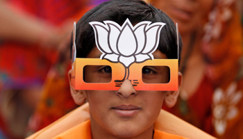 A boy wearing paper goggles attends an election campaign rally addressed by Hindu nationalist Narendra Modi (Reuters/Amit Dave)