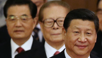 China's President Xi Jinping walks with retired leaders Jiang Zemin and Hu Jintao (Reuters/China Daily)