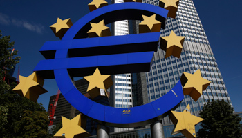 The Euro currency sign is seen in front of the European Central Bank headquarters in Frankfurt (Reuters/Alex Domanski)