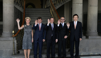 Australia's Foreign Minister Julie Bishop, Turkey's Foreign Minister Ahmet Davutoglu, Mexico's Foreign Minister Jose Antonio Meade, Indonesia's Foreign Minister Marty Natalegawa and South Korea's Foreign Minister Yun Byung-se wave  (Reuters/Henry Romero)