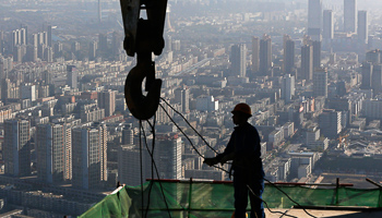 A worker operates at a construction site on the 68th storey of a building in Shenyang, Liaoning province (Reuters/Stringer)