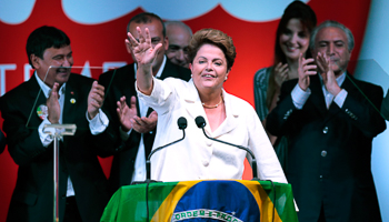 Rousseff reacts during news conference after the disclosure of the election results in Brasilia (Reuters/Ueslei Marcelino)