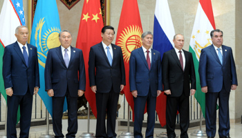 Leaders of Tajikistan, Russia, Kyrgyzstan, China, Kazakhstan and Uzbekistan pose for a picture before a session of Shanghai Cooperation Organization summit (Reuters/Mikhail Klimentyev/RIA Novosti/Kremlin)