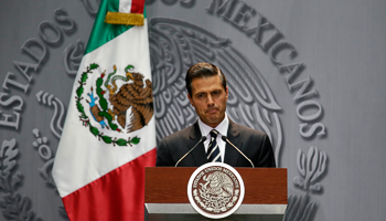 Enrique Pena Nieto delivers a message at the National Palace in downtown Mexico City (Reuters/Tomas Bravo)