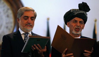 Afghanistan's President Ashraf Ghani Ahmadzai and Afghanistan's Chief Executive Abdullah Abdullah take the oath during their inauguration in Kabul (Reuters/Omar Sobhani)