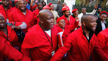 Julius Malema, leader of the opposition Economic Freedom Fighters (EFF), leaves parliament in Cape Town (Reuters/Mike Hutchings)
